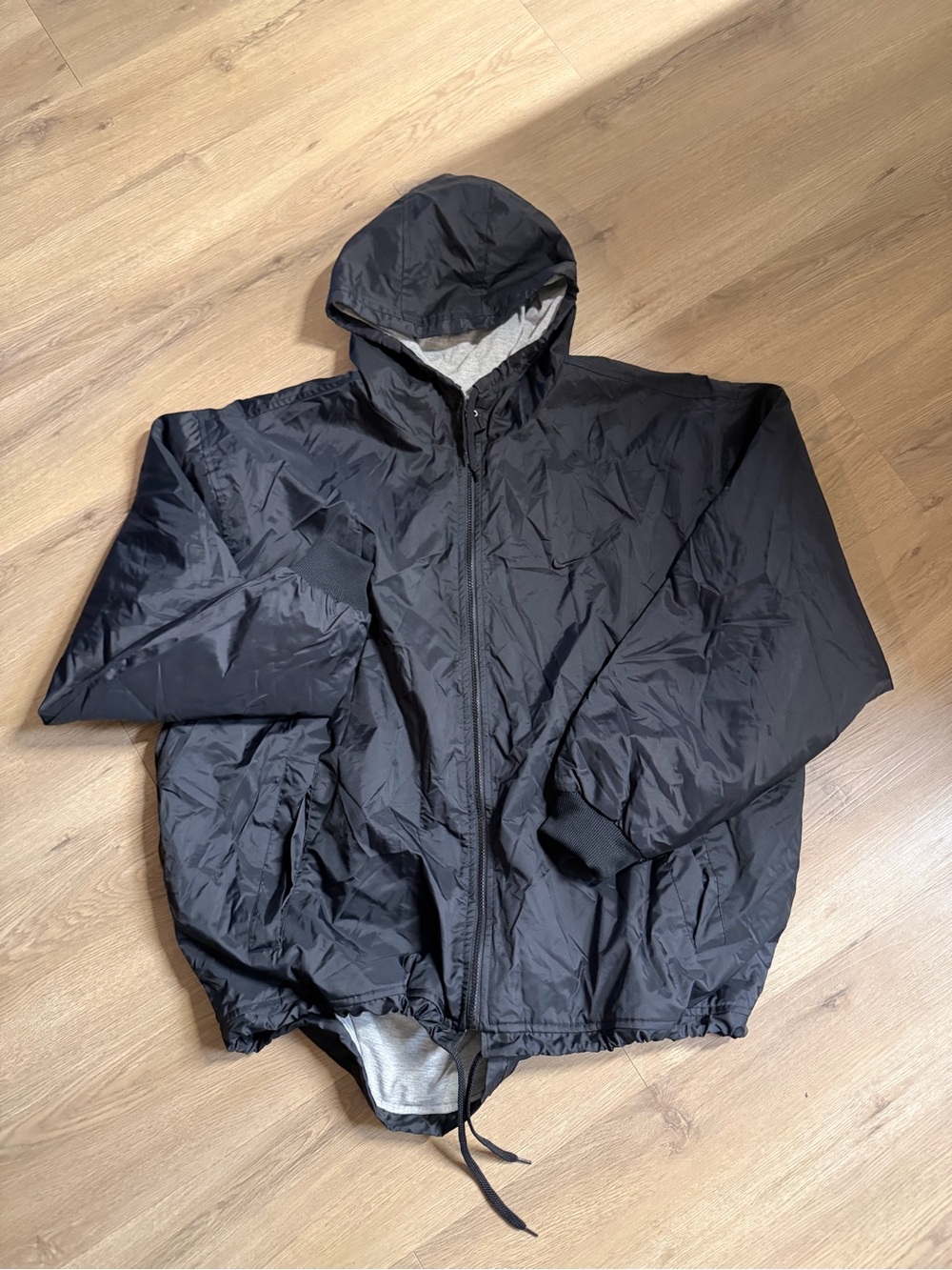Nike Black Hooded Windbreaker Jacket with Drawstring Hem